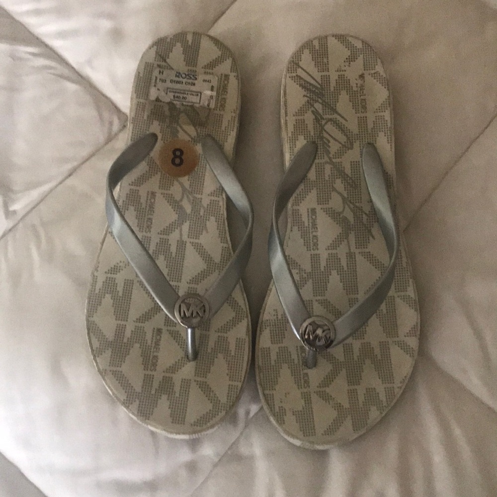 Michael kors flip flops.